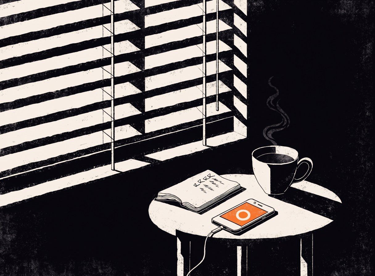 A phone ringing on a small table beside a cup of coffee and a notebook with a checklist